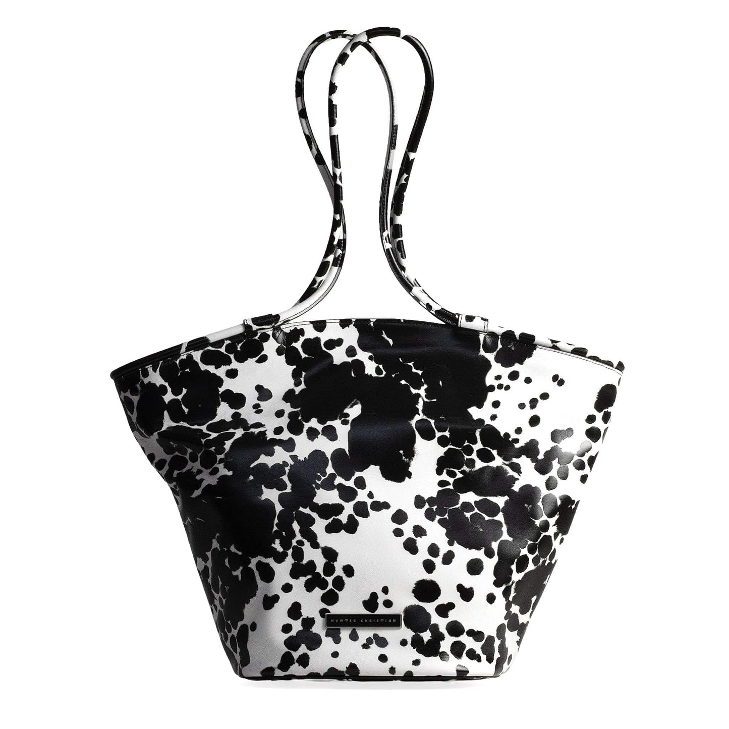 Front view of KO Oversized Leather Tote – First Edition in black and white printed Italian leather with tubular straps and structured silhouette