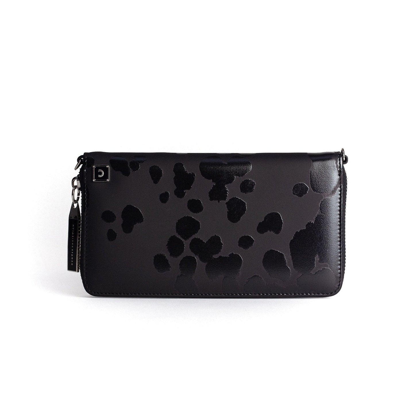 Back view of women’s designer wallet in matte black leather with tonal pattern detail