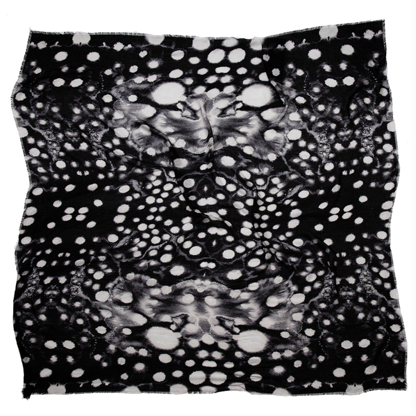 Full flat lay of the Nyx scarf by Hunter Christian, featuring a bold black-and-white abstract pattern with soft gradients and organic dot formations across vegan modal fabric.